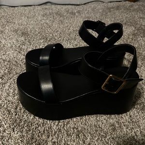 Black chunky platform sandals. Only worn once. Brand is truffle collection.